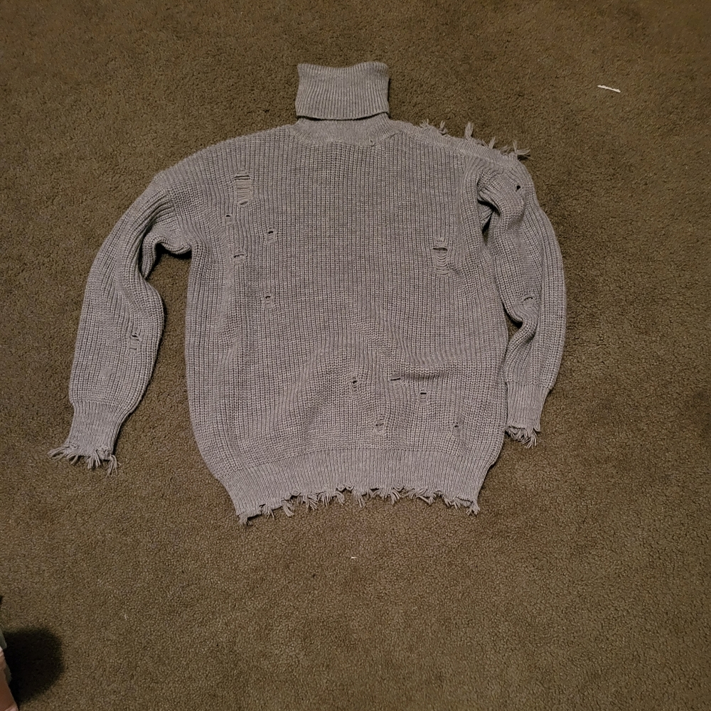 Distressed sweater